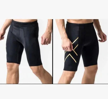 Men's black compression shorts with gold pattern, front and side views