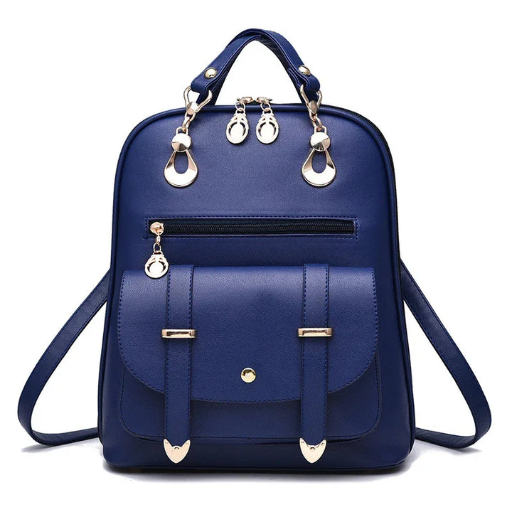stylish navy blue leather backpack with gold hardware, front zip pocket, and flap closure
