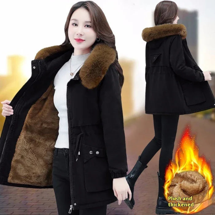 woman wearing black winter coat with brown fur collar and thick plush lining, warm outerwear for cold weather