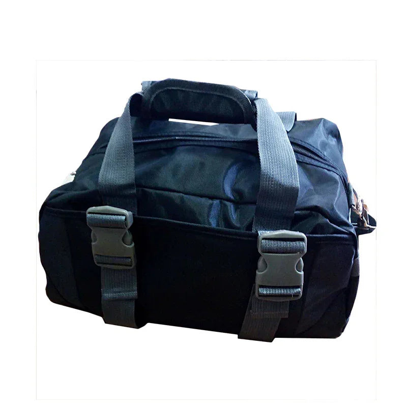 Black nylon duffel bag with handles, zipper closure, and buckle straps on white background