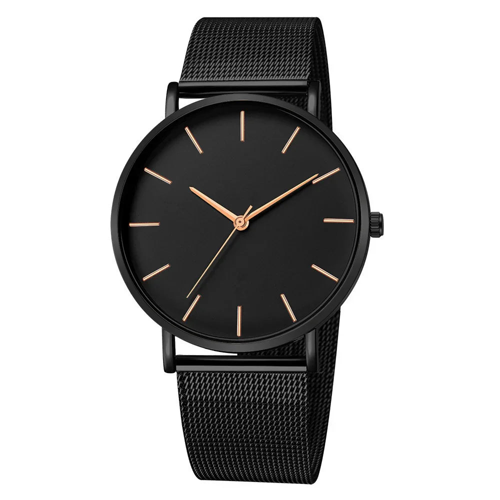 Minimalist black wristwatch with mesh strap and rose gold hour markers and hands