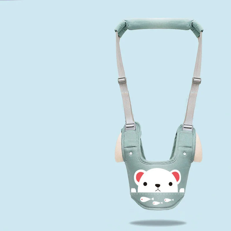 Green baby jumper harness with white bear and fish design on light blue background