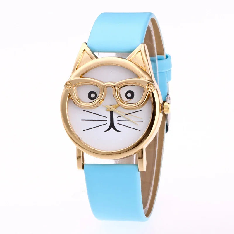 Cute cat-themed wristwatch with gold cat ears and glasses, white dial, and light blue strap