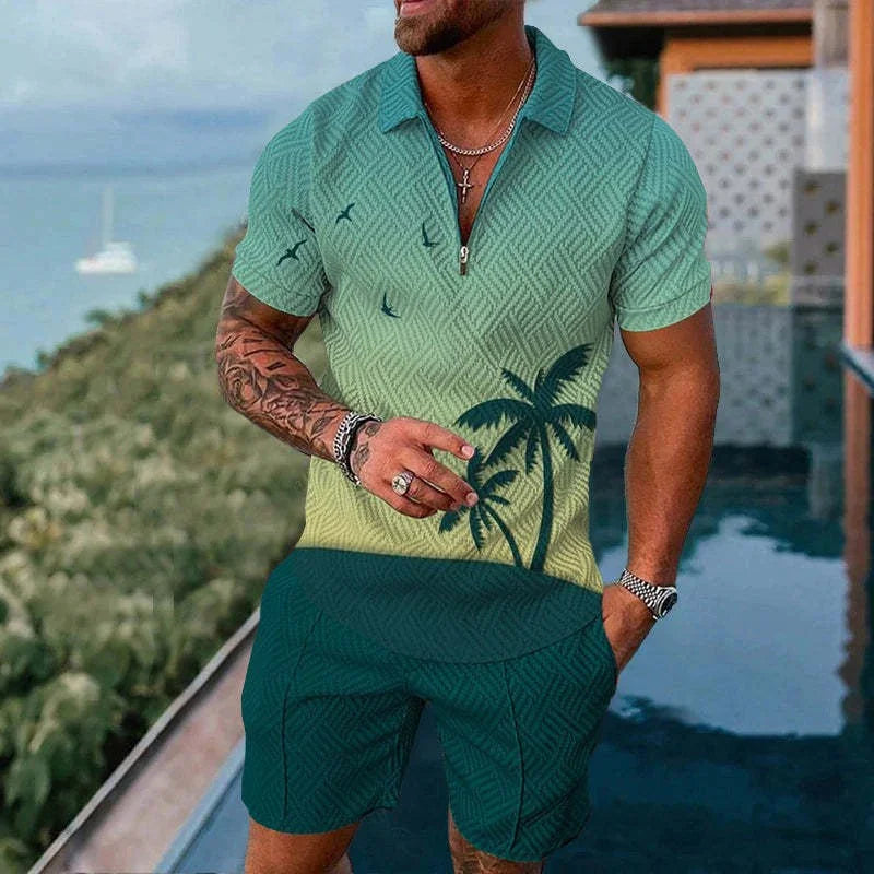 Man wearing green palm tree print short sleeve shirt and matching shorts near pool with ocean view
