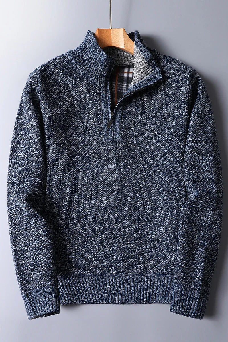 Men's blue textured knit sweater with quarter zip and ribbed collar cuffs and hem
