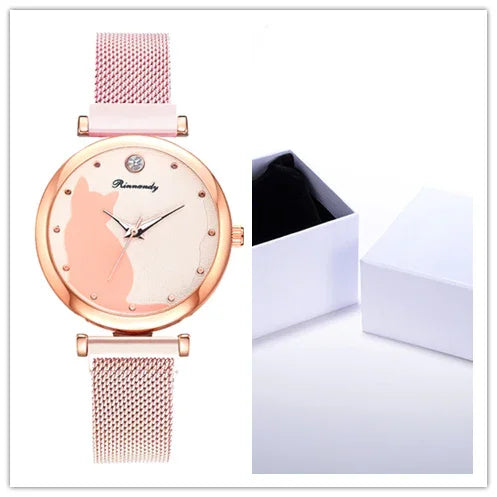 Rose gold women's wristwatch with cat silhouette dial and mesh band, next to open white box