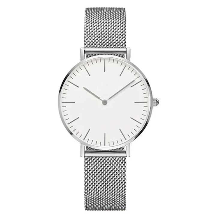 Minimalist silver wristwatch with white dial and mesh metal strap