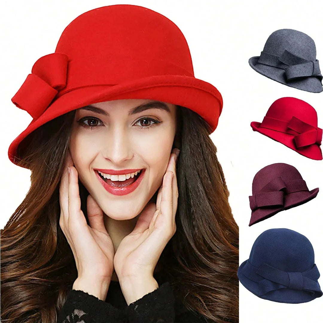 Smiling woman wearing stylish red cloche hat with bow; additional hats in gray, red, maroon, and navy blue