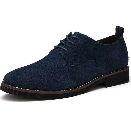 Men's navy blue suede lace-up dress shoe with black sole and stitching detail