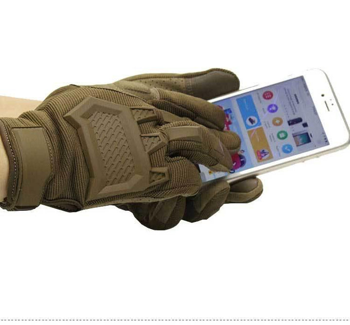 Tactical brown glove using smartphone with touchscreen, showcasing touchscreen compatibility and rugged design