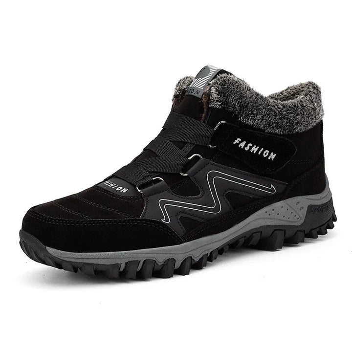 Black winter hiking boot with gray sole, fur lining, and sporty design details