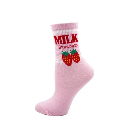 Pink ankle sock with red strawberries and text 'MILK Strawberry' design on white cuff
