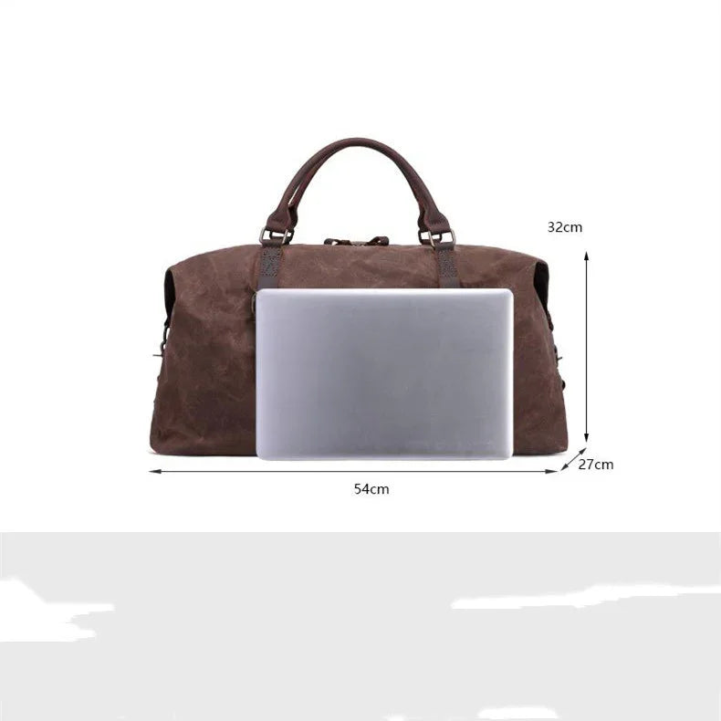 Brown leather travel duffle bag with handles, 54cm wide, 32cm high, 27cm deep, laptop size comparison