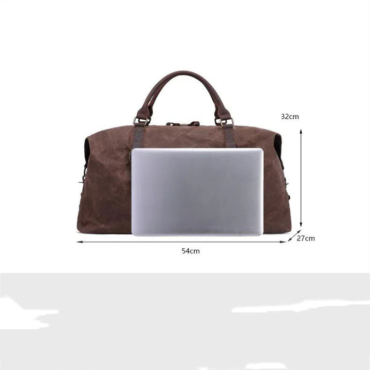 Brown leather travel duffle bag with handles, 54cm wide, 32cm high, 27cm deep, laptop size comparison