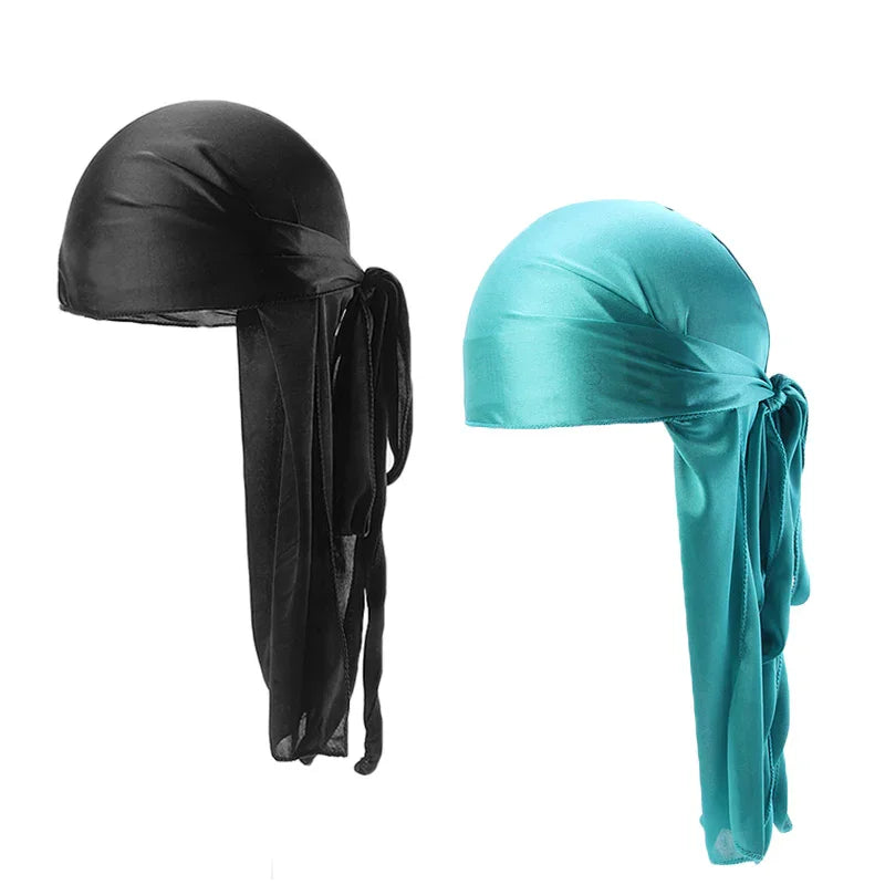 Black and turquoise satin durags with long ties, smooth and shiny fabric, side view
