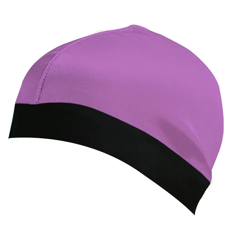purple swim cap with a black band around the base, smooth fabric, seamless design