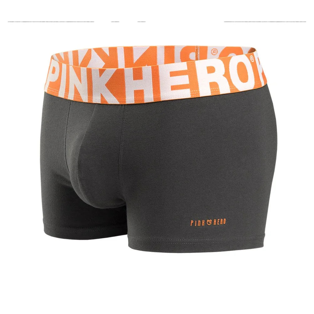 Black men's boxer briefs with wide orange waistband featuring Pink Hero logo and branding
