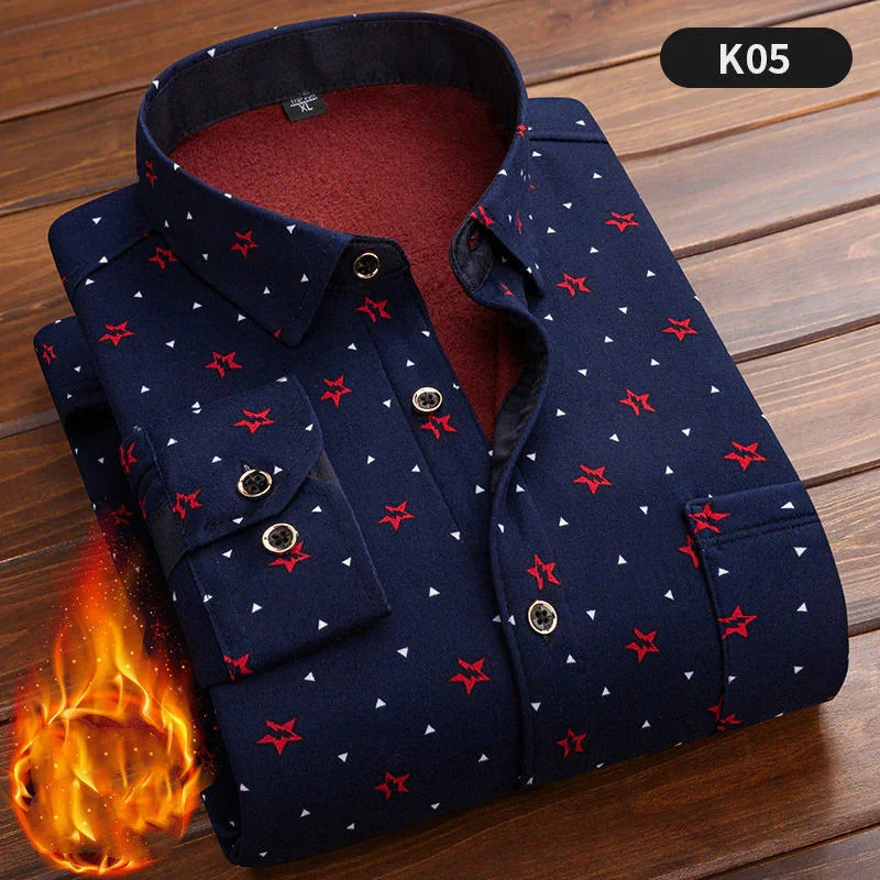 Folded navy blue men's shirt with red star print and white triangles on wooden surface, warm fleece-lined