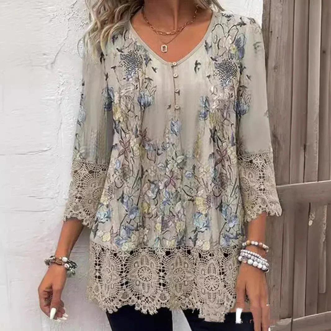 Boho floral lace tunic top with 3/4 sleeves and crochet hem worn with bracelets