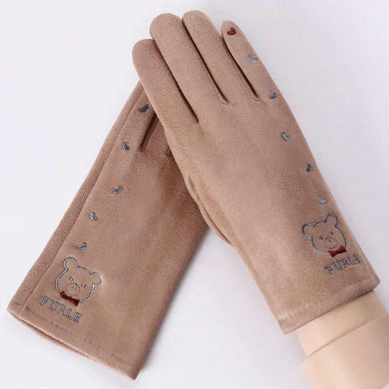 Beige winter gloves with embroidered bear, hearts, and Furle brand logo on white background