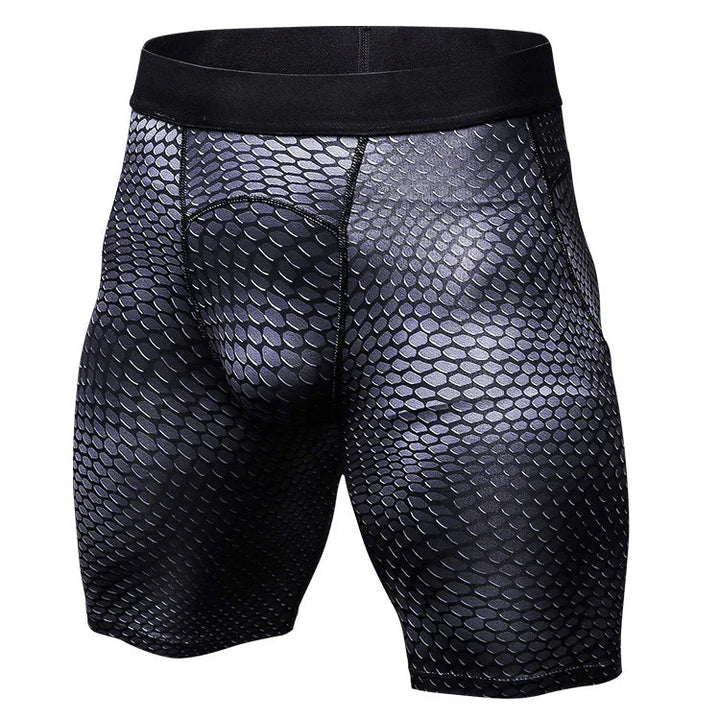 Men's black compression shorts with hexagonal scale pattern design