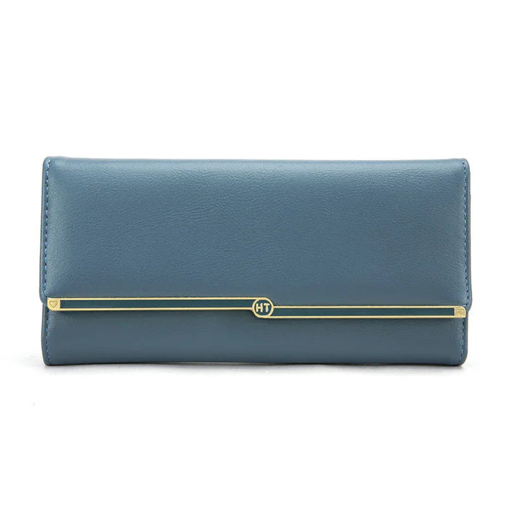 Elegant blue leather wallet with gold HT logo bar detail on white background