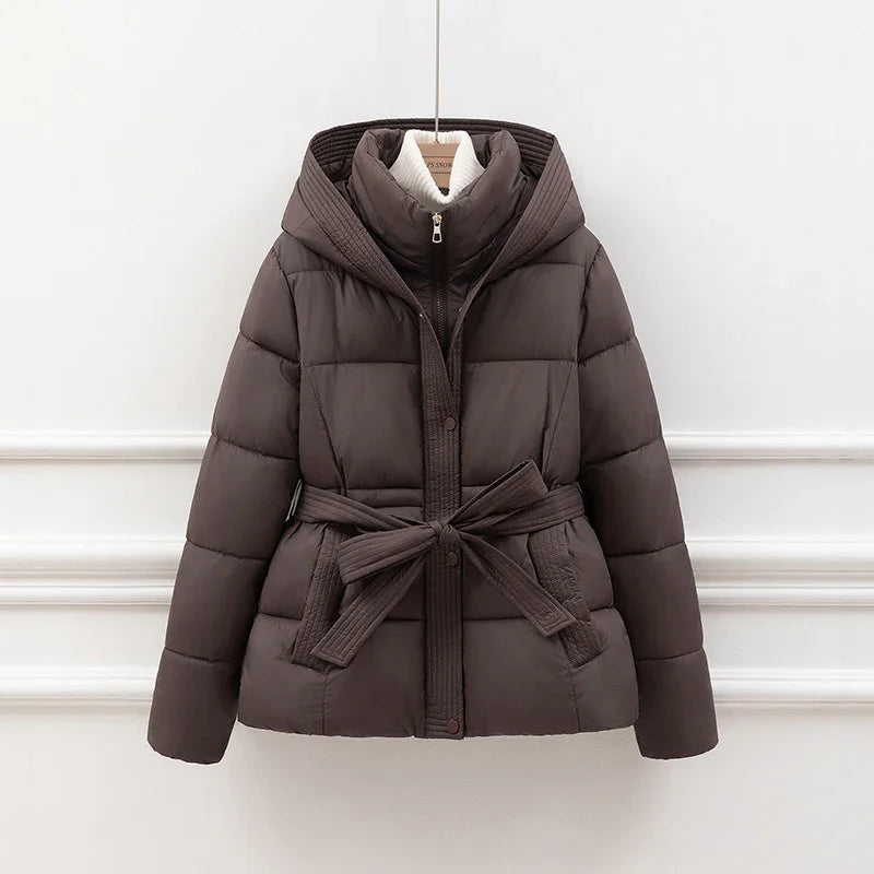 Dark brown quilted puffer jacket with hood, front zipper, snap buttons, and waist tie belt
