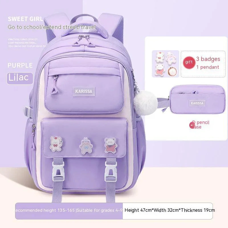 Lilac purple Karissa backpack with front pockets, cute bear badges, white pompom, and matching pencil case