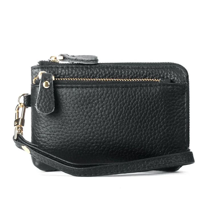 Black pebbled leather wristlet wallet with gold zipper and detachable strap