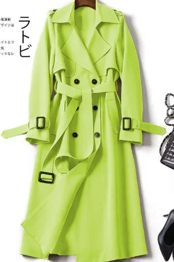 Bright lime green trench coat with double-breasted buttons, belted waist and cuffs