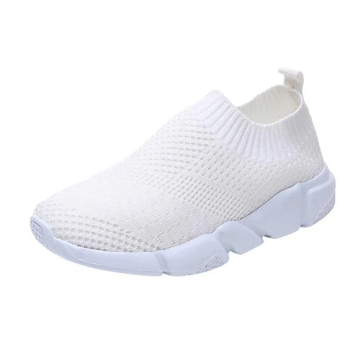 All-white slip-on knit sneaker with flexible sole and sock-like ankle collar