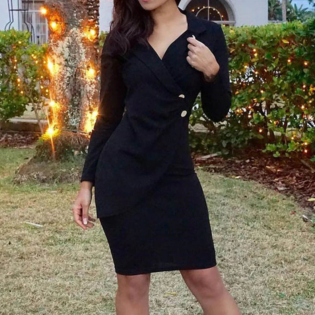 Woman wearing a chic black long-sleeve dress with gold buttons in a garden lit by string lights
