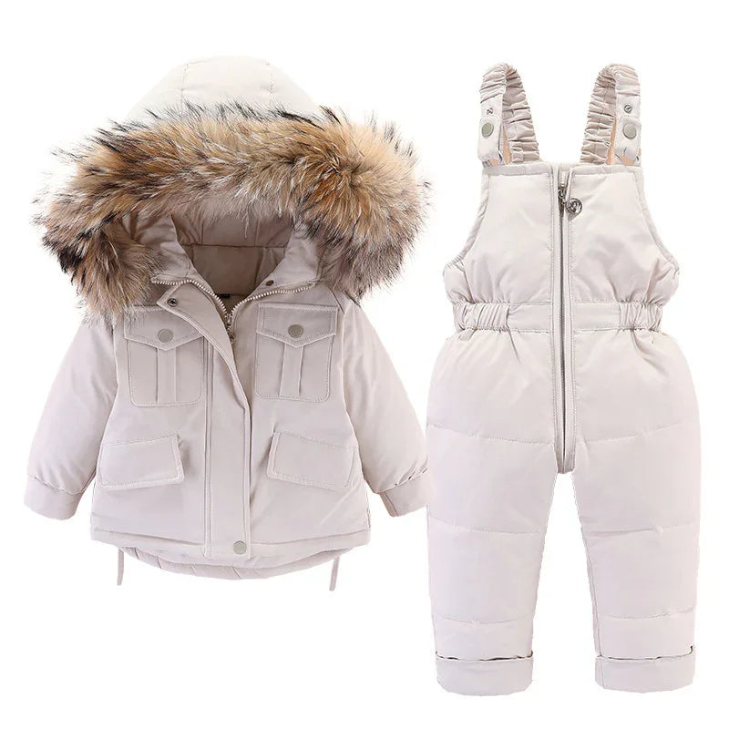 Beige toddler winter jacket with fur hood and matching insulated snow bib overalls