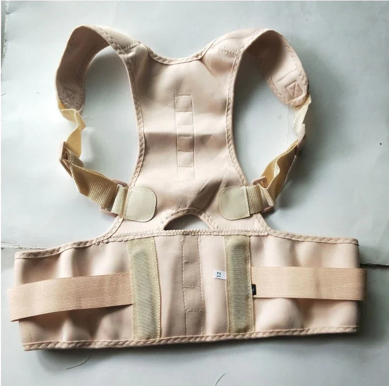 Beige adjustable posture corrector back brace on flat surface