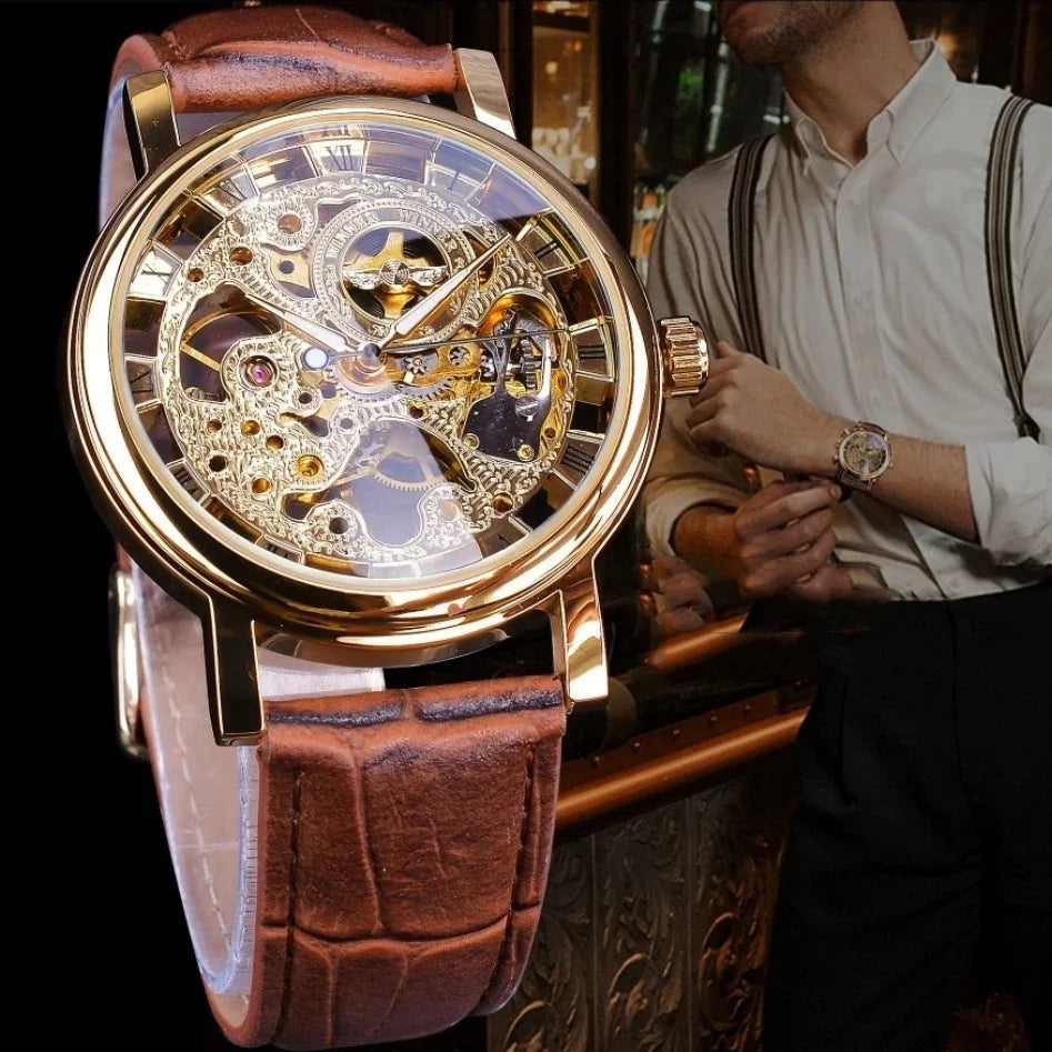 Luxury gold skeleton mechanical wristwatch with brown leather strap worn by man in vintage outfit