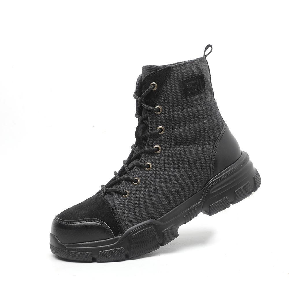 Black high-top canvas and leather sneaker boot with thick rubber sole on white background