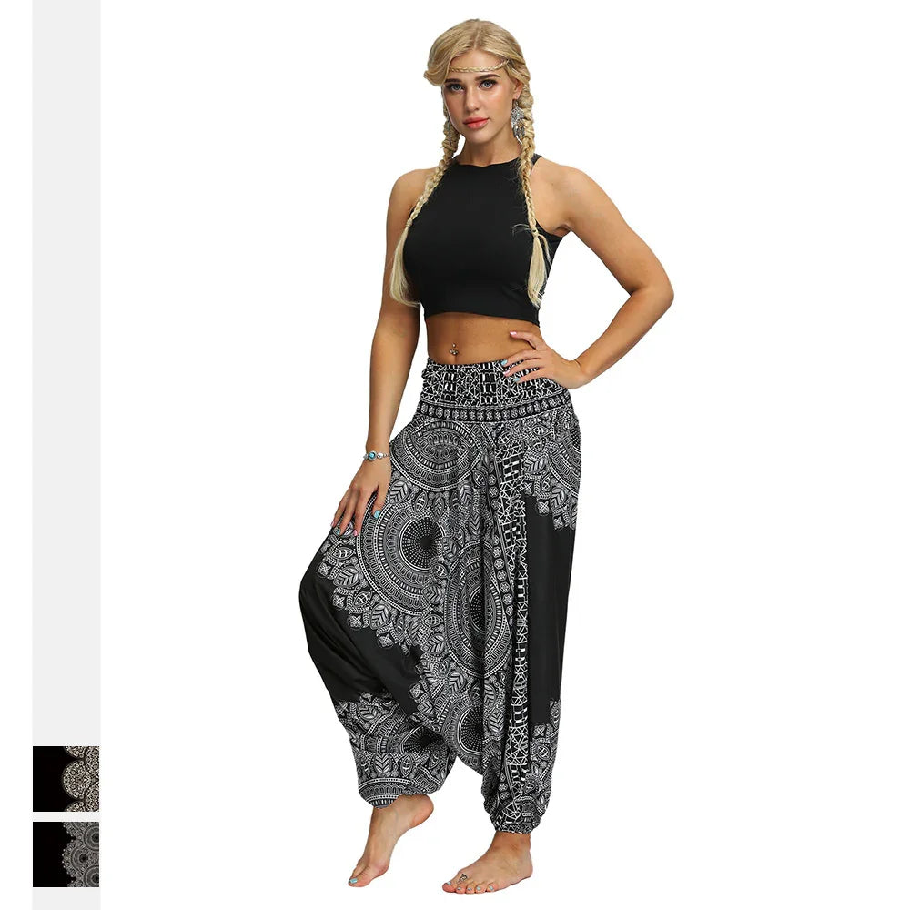 Blonde woman with braided hair wearing black crop top and black white patterned harem pants