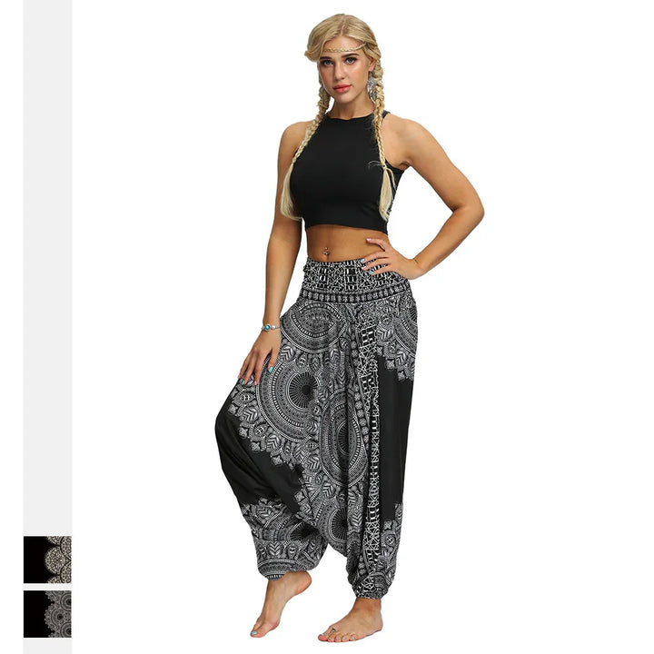 Blonde woman with braided hair wearing black crop top and black white patterned harem pants