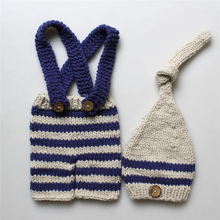Knitted baby romper and matching hat with navy and cream stripes and wooden buttons