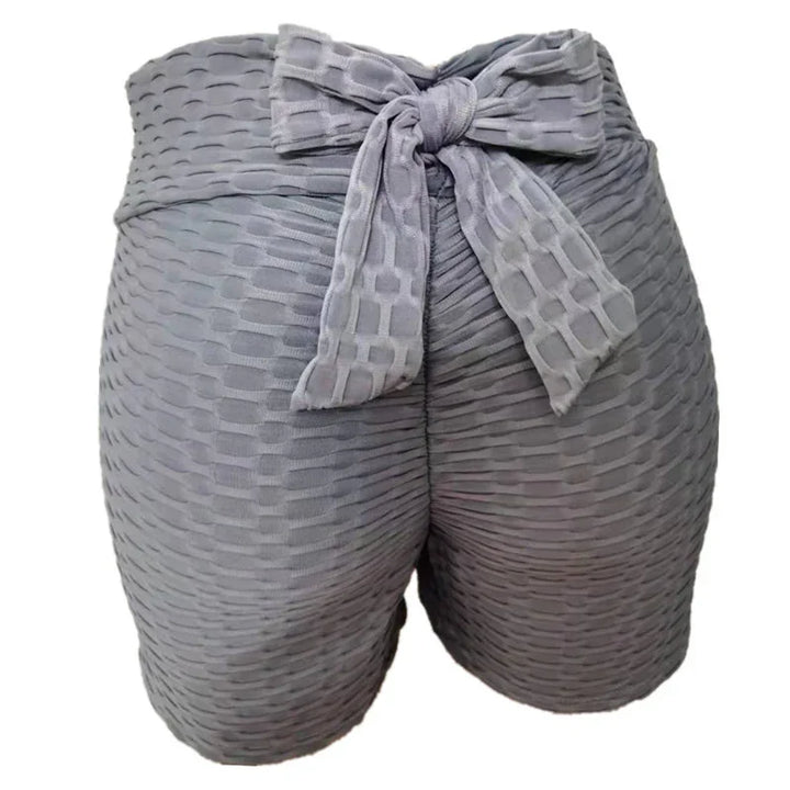 Textured gray high-waisted shorts with front tie bow, stylish workout or casual wear