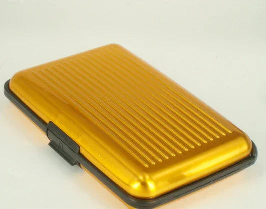 gold metallic slim cardholder case with black edges and a latch closure