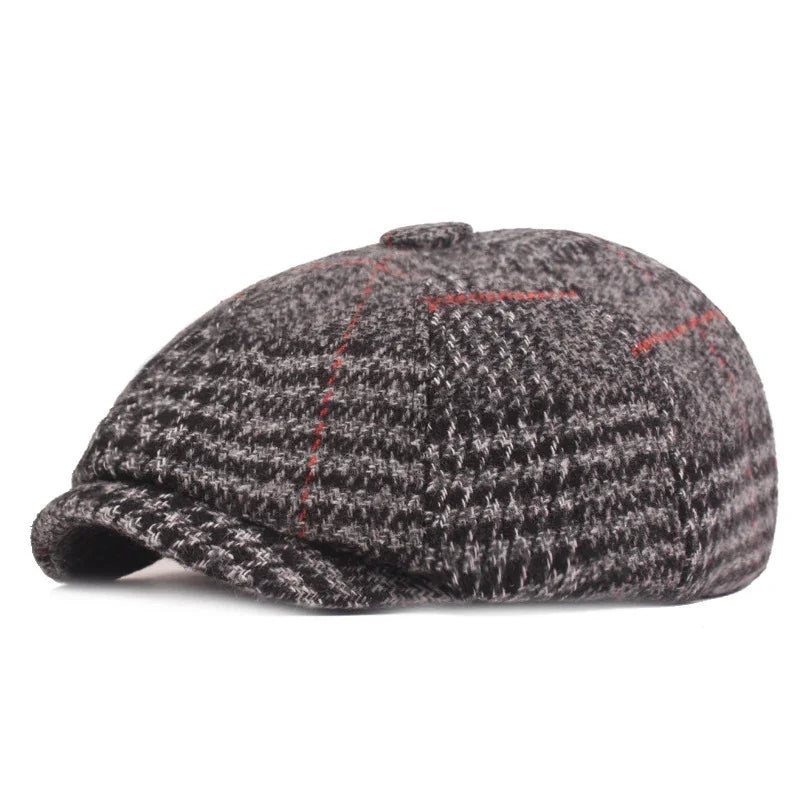 Classic gray tweed newsboy cap with red plaid accents, wool texture, vintage style hat