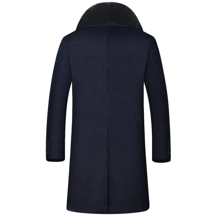 Back view of a navy blue woolen overcoat with a black fur collar and buttoned cuffs