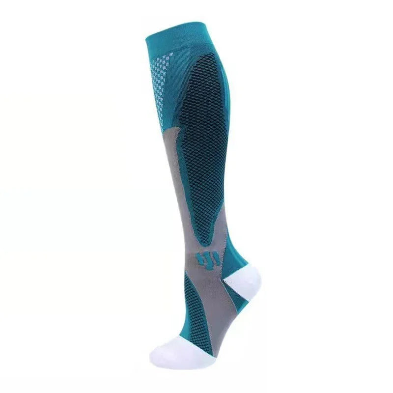 Teal and gray compression sock with white toe and heel, designed for athletic performance