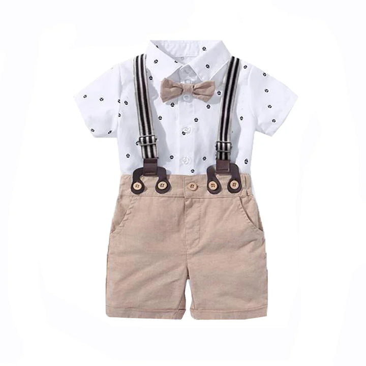 Baby boy outfit with white patterned shirt, beige shorts, striped suspenders, and beige bow tie
