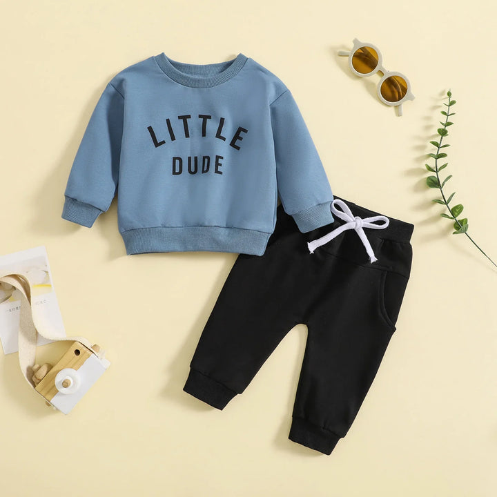 Toddler outfit with blue sweatshirt reading 'LITTLE DUDE' and black jogger pants with white drawstring
