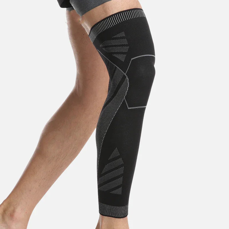 Black compression leg sleeve on male leg for sports support and injury recovery