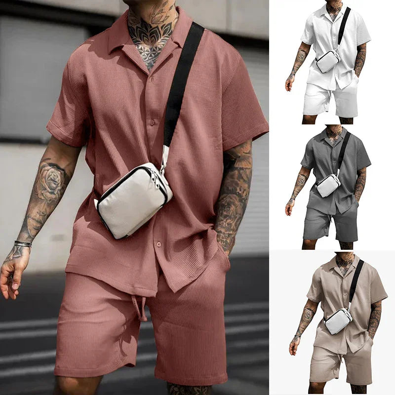 Men's casual two-piece short sleeve shirt and shorts summer outfit in rose, white, gray, and beige colors with crossbody bag