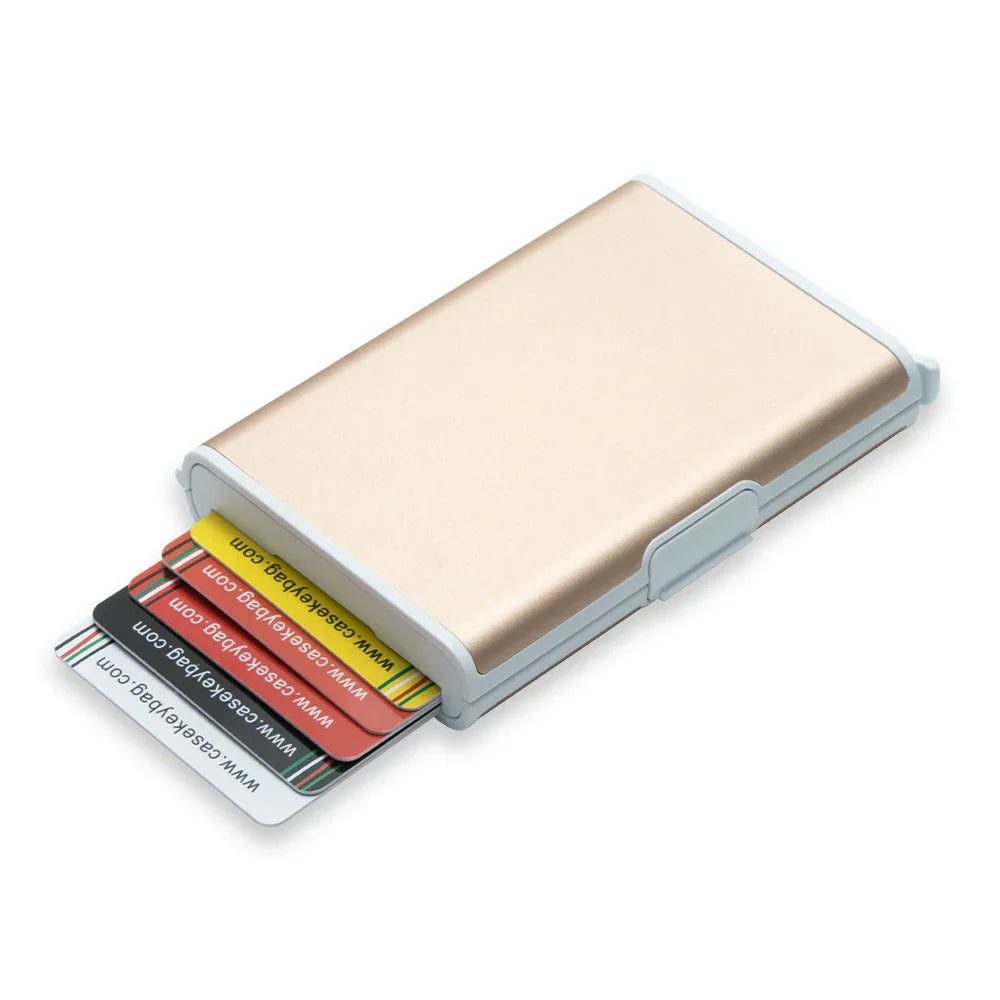 Gold credit card holder wallet with multiple colorful cards partially visible on white background