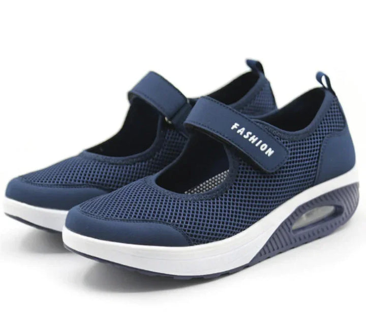 Navy blue mesh women’s sporty Mary Jane sneakers with adjustable strap and white sole